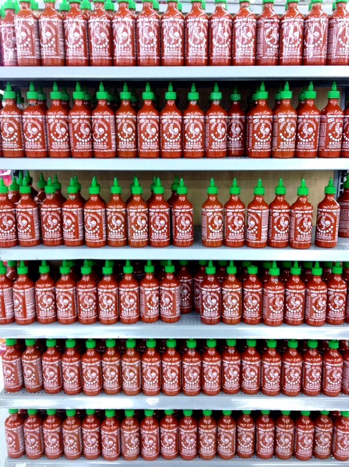 Shelves of Sriracha Sauce